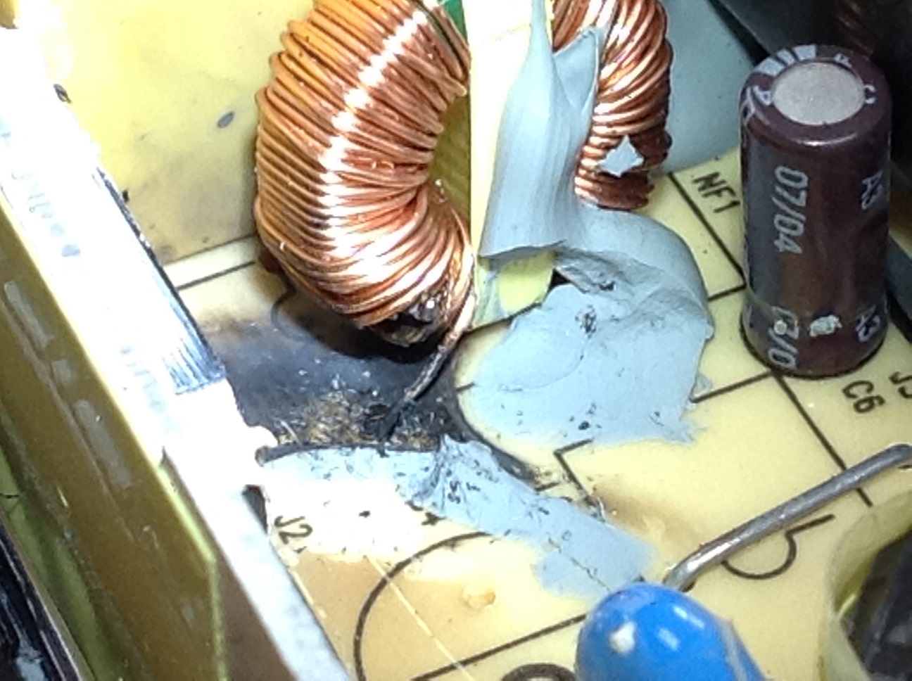HiPro Power Adapter Burned out Inductor Coil.jpg
